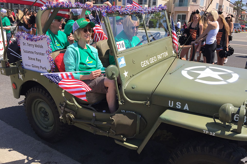 Virginia Park drives BRC board members in her World War II Jeep replica.